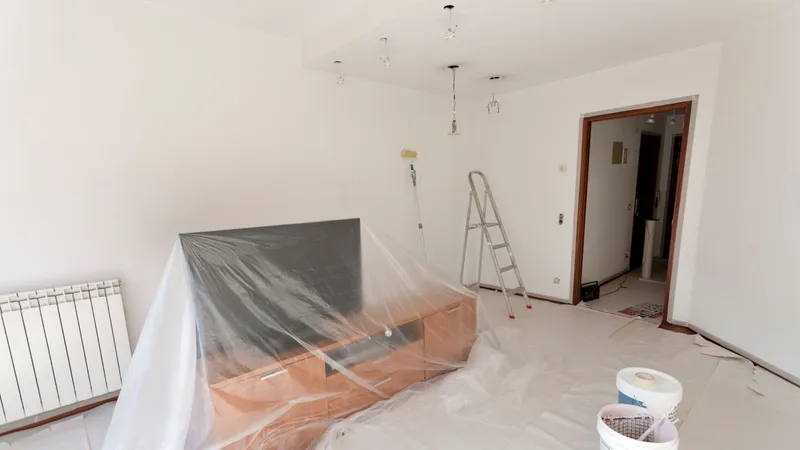 Herstel van een muur of plafond na waterschade door lekkage