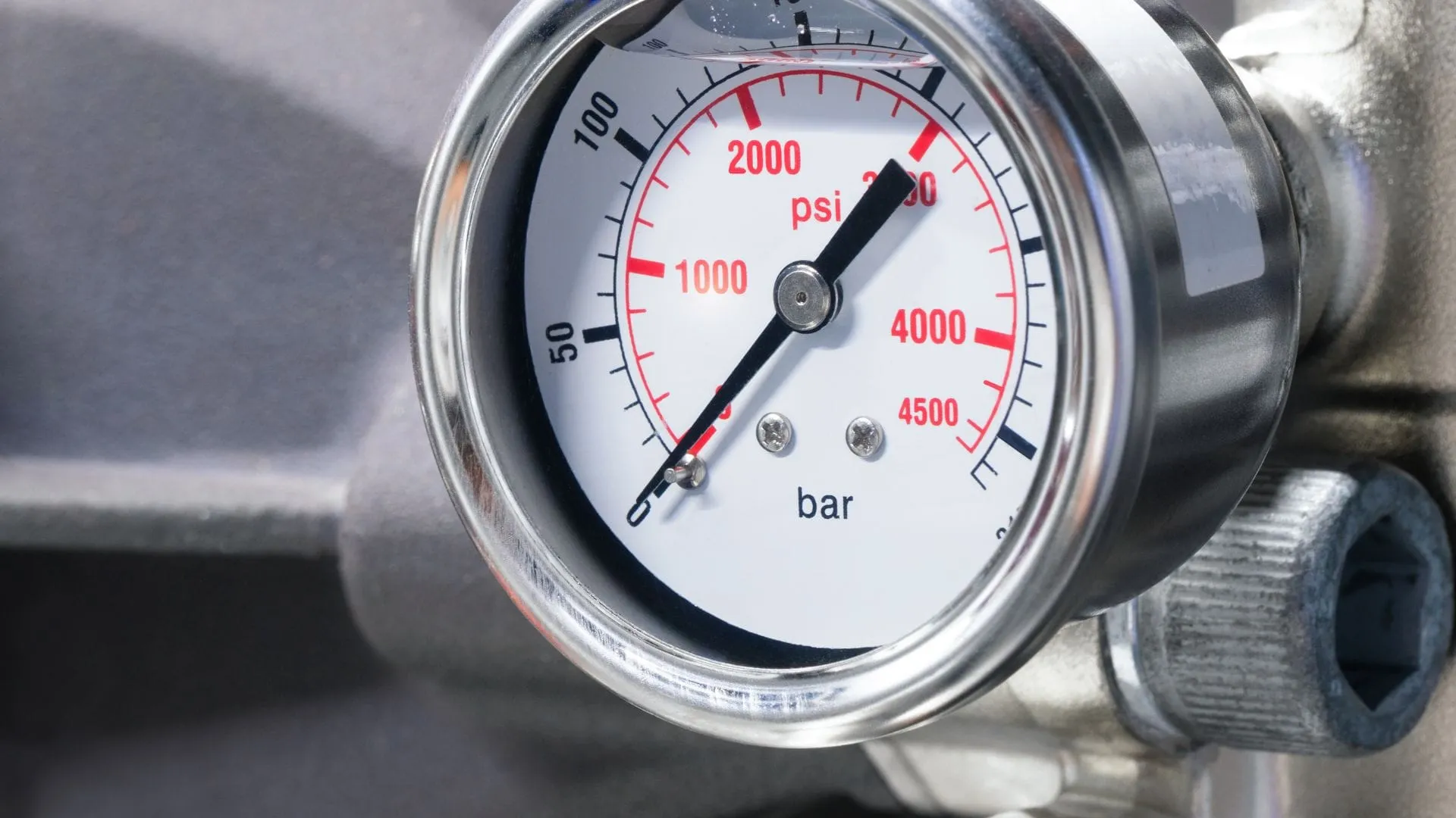 Pressure gauge showing the water pressure in bar