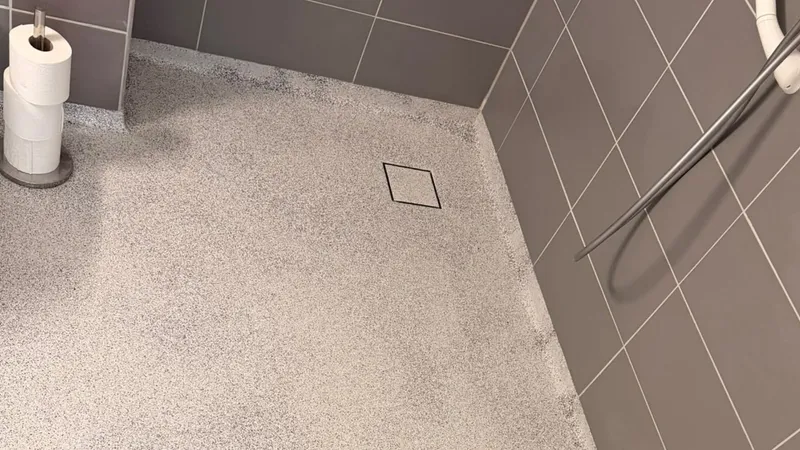 Doucheruimte met afvoerputje in de vloer