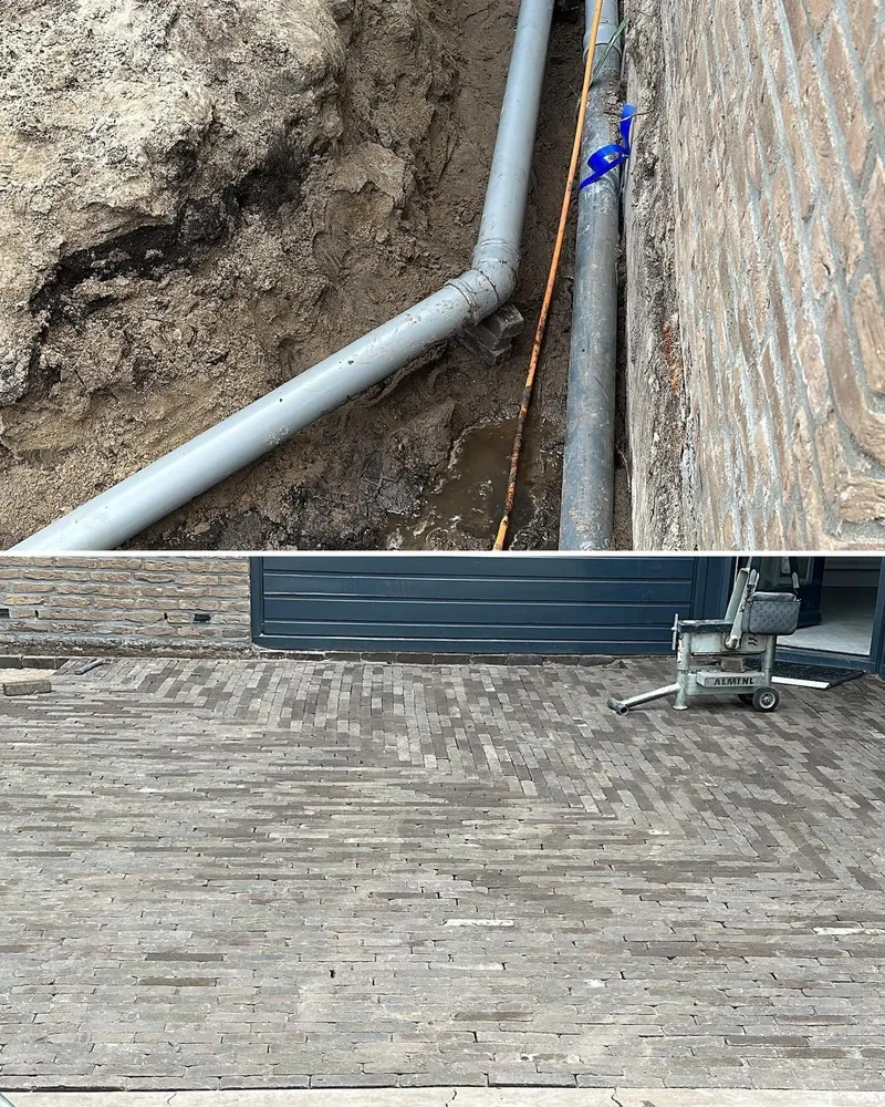 Graafwerk voor de rioolleiding langs de gevel en de weer gelegde klinkerbestrating