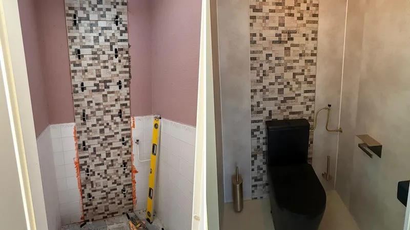 Nieuwe wandtegels gezet in een badkamer of toilet
